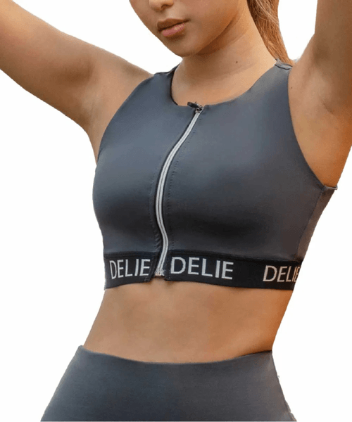 Top deportivo con cremallera y soporte ancho para el busto