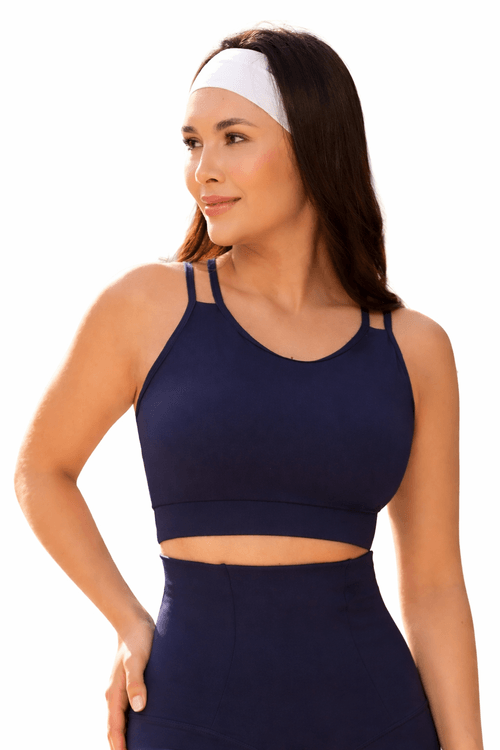 Top deportivo de alta compresión en abdomen alto con tiras